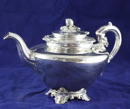 A late Victorian silver plated teapot,